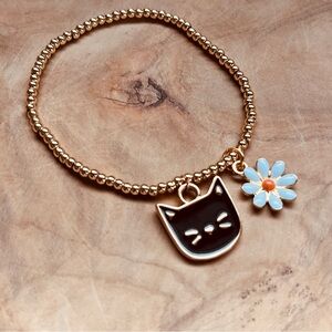 Gold Beaded Bracelet with Cat and Daisy Flower Charms